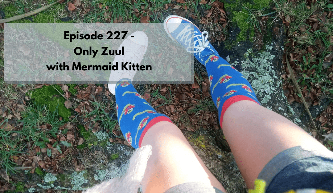 Mermaid Kitten wearing Converse and knee high socks, standing in the grass. Text reads: Episode 227—Only Zuul with Mermaid Kitten