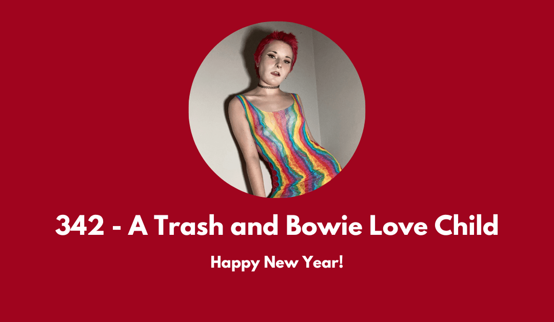 A New Year's Q&A with Dick and Gwen. Image is of Gwen in a rainbow stocking dress, looking like a Trash and David Bowie love child.